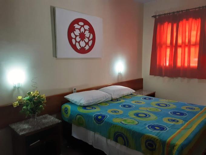 Postel nebo postele na pokoji v ubytování Hotel Patipe Canavieiras