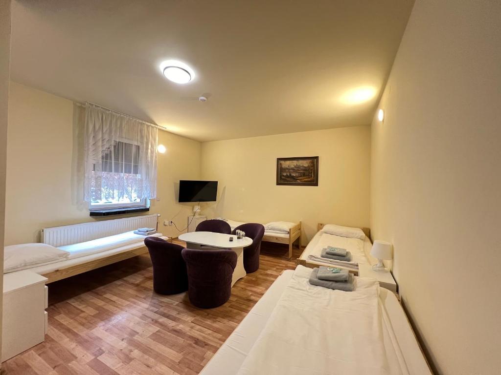 Voodi või voodid majutusasutuse ETNA - Hostel -Noclegi Rzeszów 24 Pokoje toas