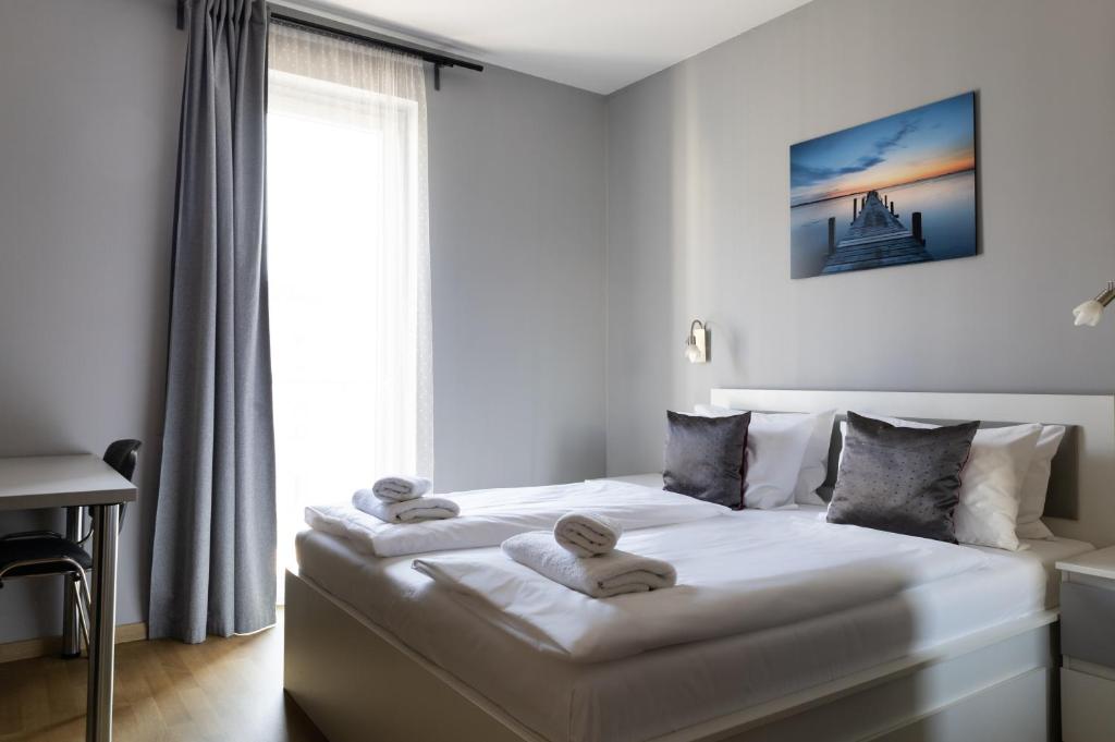 Postel nebo postele na pokoji v ubytování Di Verdi Imperial Hotel