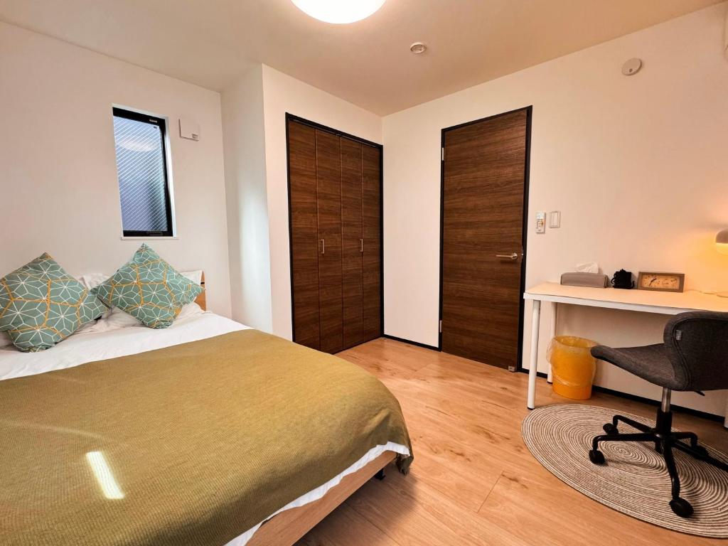 Postel nebo postele na pokoji v ubytování Home Stroy in Tokyo - Luxury Villa Minowa&Ueno-三ノ輪一戸建て&東京屋語
