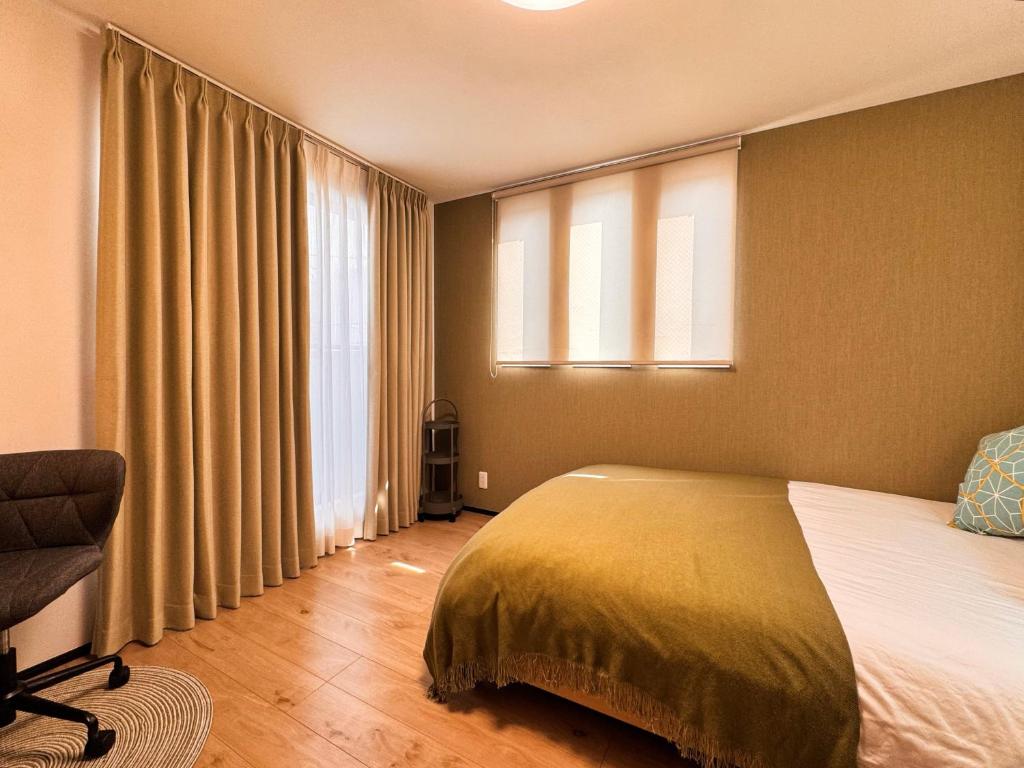 Postel nebo postele na pokoji v ubytování Home Stroy in Tokyo - Luxury Villa Minowa&Ueno-三ノ輪一戸建て&東京屋語