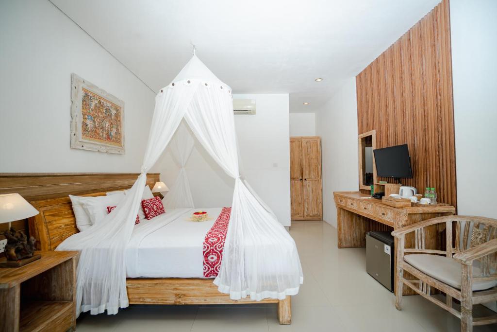 Postel nebo postele na pokoji v ubytování Kailash Bali