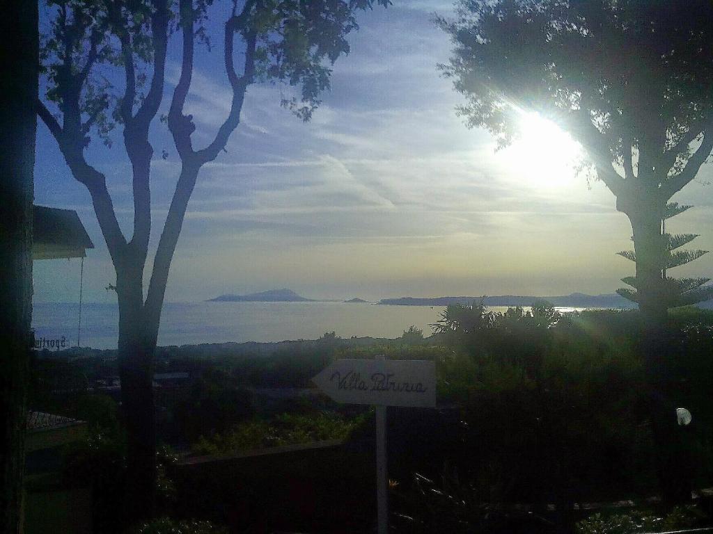 a sign in front of a view of the water at B&B Villa Patrizia in Ercolano