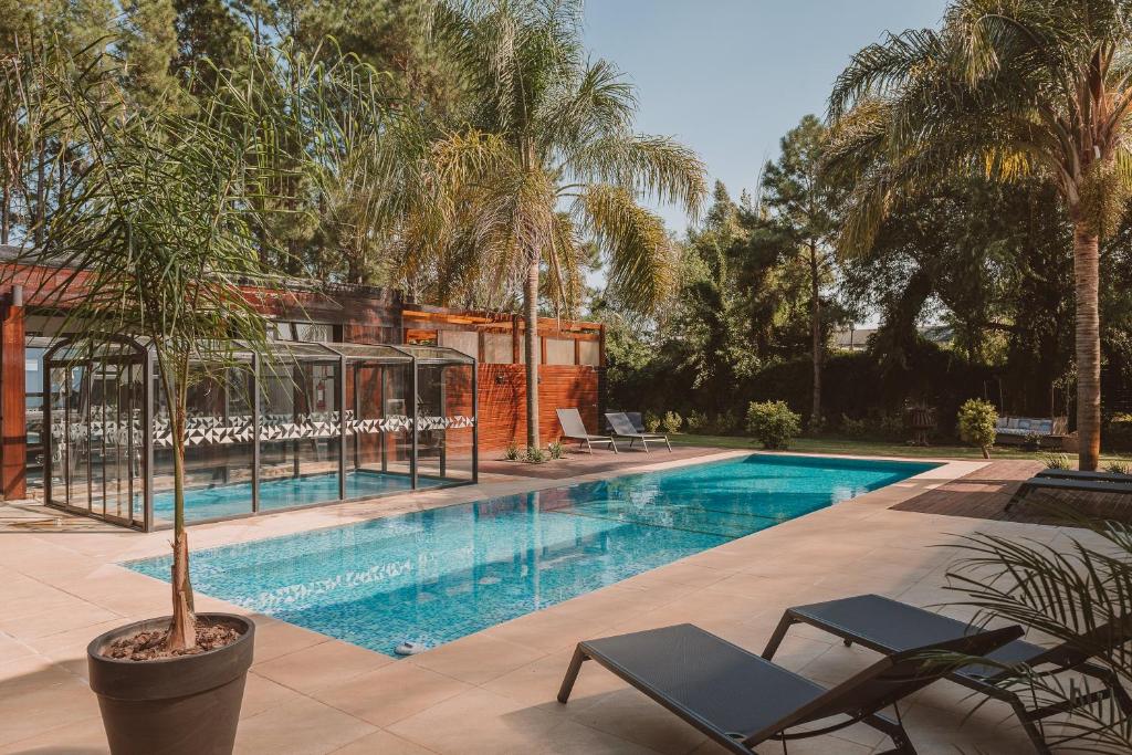 Bazén v ubytování Puerto Dijama Hotel Boutique nebo v jeho okolí