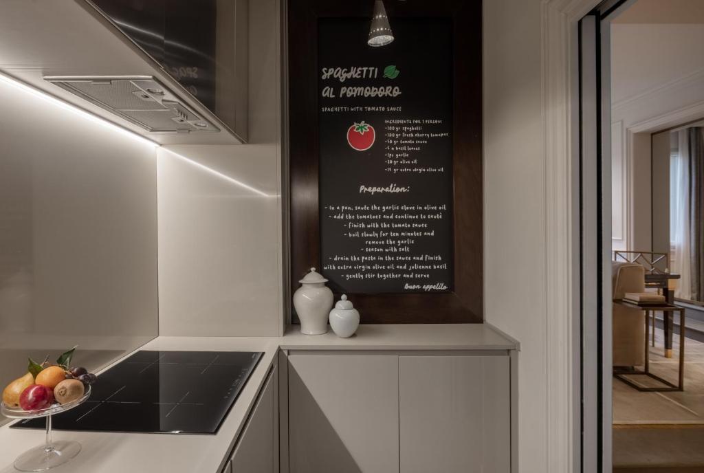 Kuchnia lub aneks kuchenny w obiekcie Lungarno Luxury Apartments - by Lungarno Collection