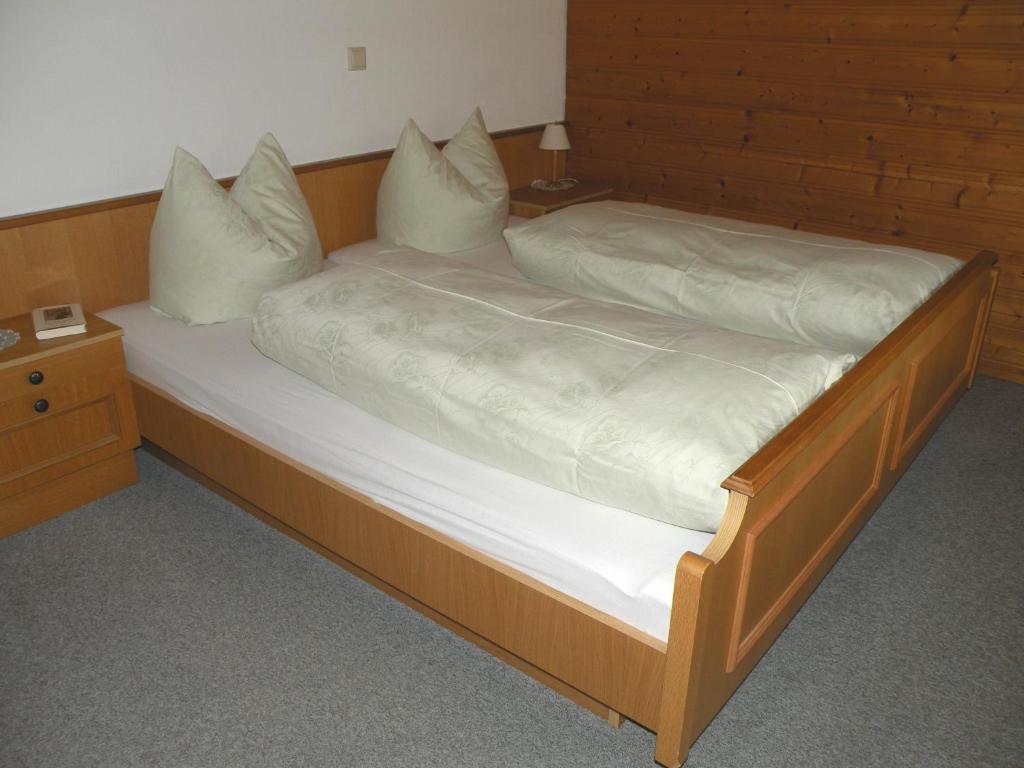 Postel nebo postele na pokoji v ubytování Haus Simma