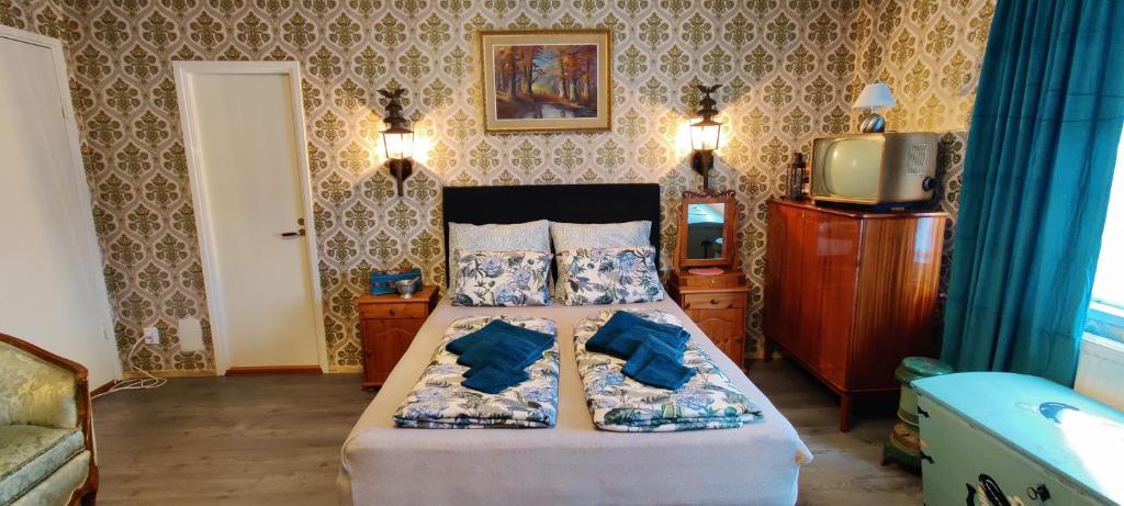 Postel nebo postele na pokoji v ubytování B&B Västralandet