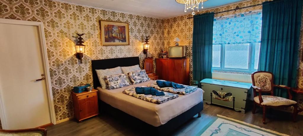 Postel nebo postele na pokoji v ubytování B&B Västralandet