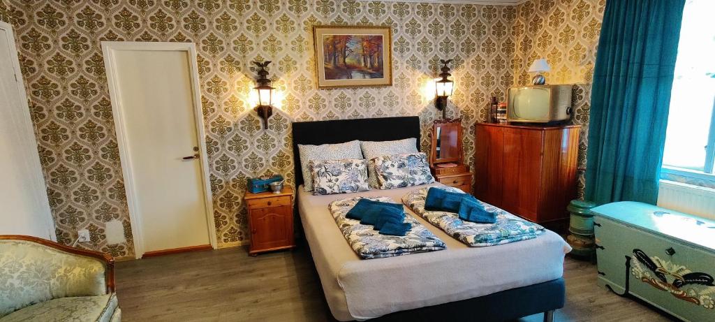 Postel nebo postele na pokoji v ubytování B&B Västralandet