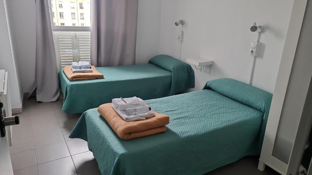 Postel nebo postele na pokoji v ubytování Motion Chueca Hostel