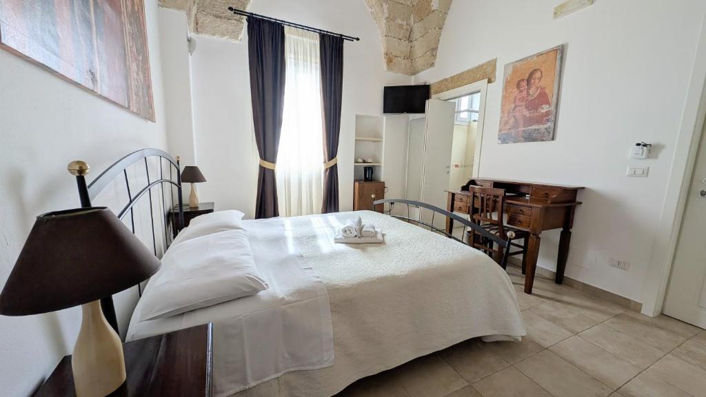 Postel nebo postele na pokoji v ubytování B&B Corte Regina Esther