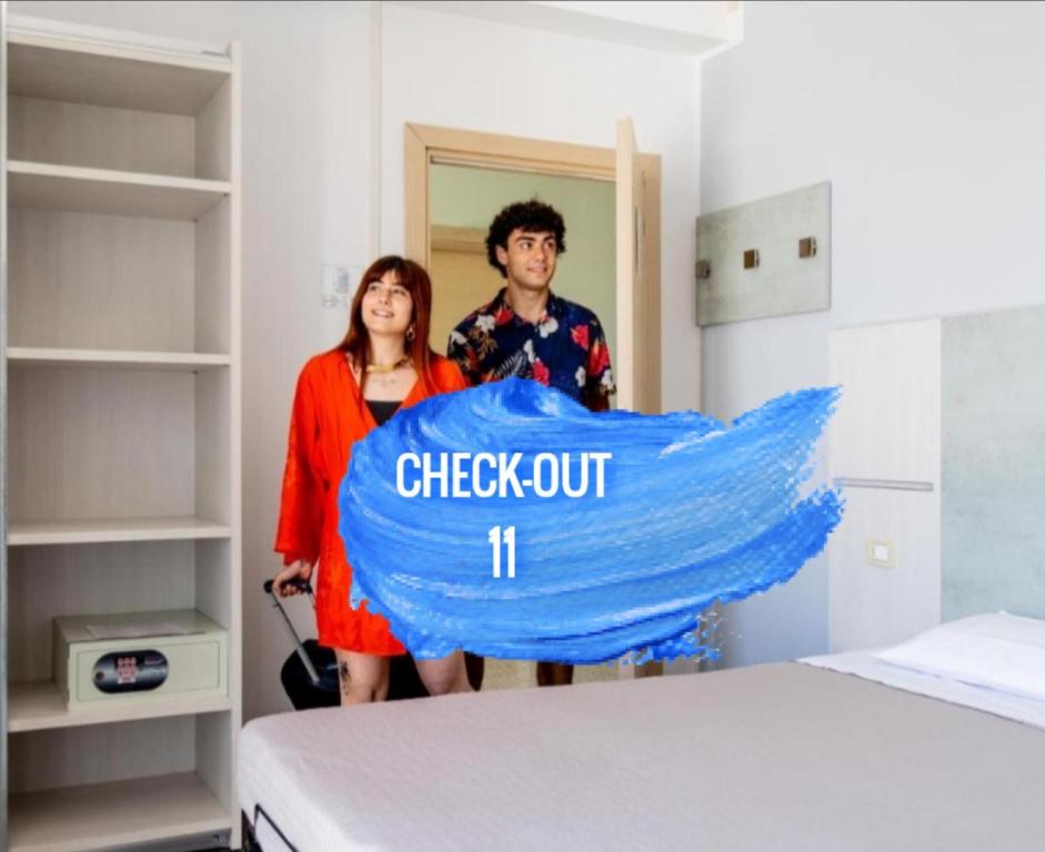 Posteľ alebo postele v izbe v ubytovaní Hotel Kim