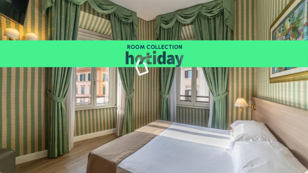 Postel nebo postele na pokoji v ubytování HOTIDAY Room Collection - Roma Porta Pia