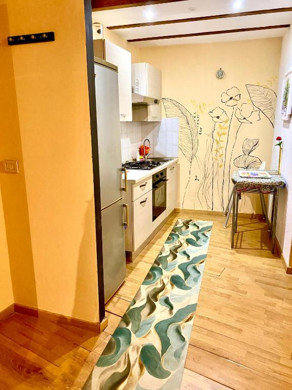 A kitchen or kitchenette at Sakè Loft