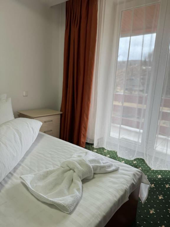 Postel nebo postele na pokoji v ubytování Hotel Iadolina