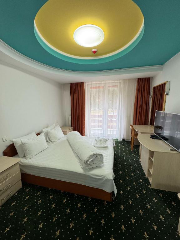Postel nebo postele na pokoji v ubytování Hotel Iadolina