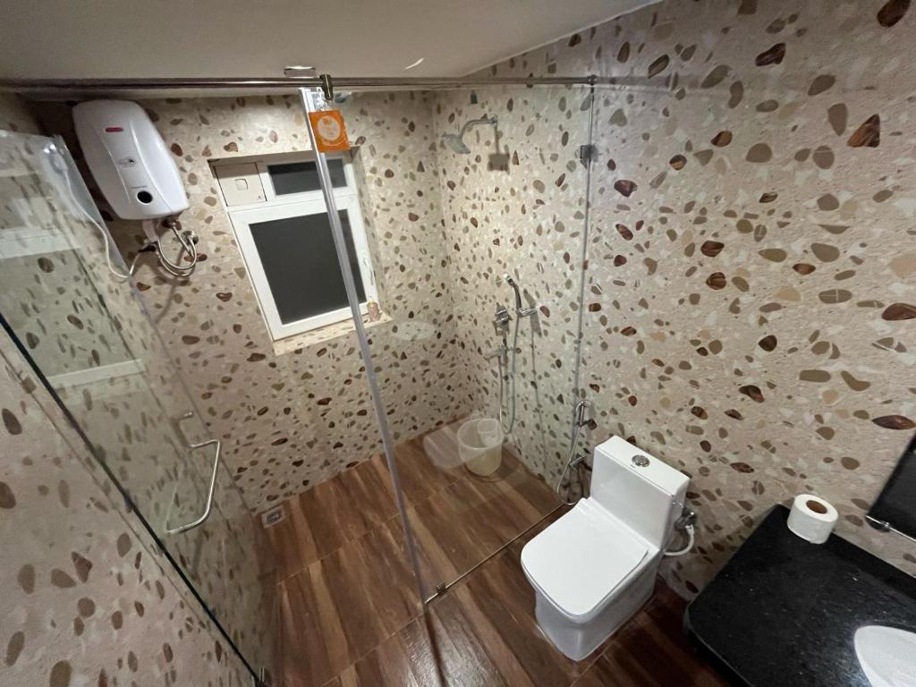 Koupelna v ubytování Hotel Lotus