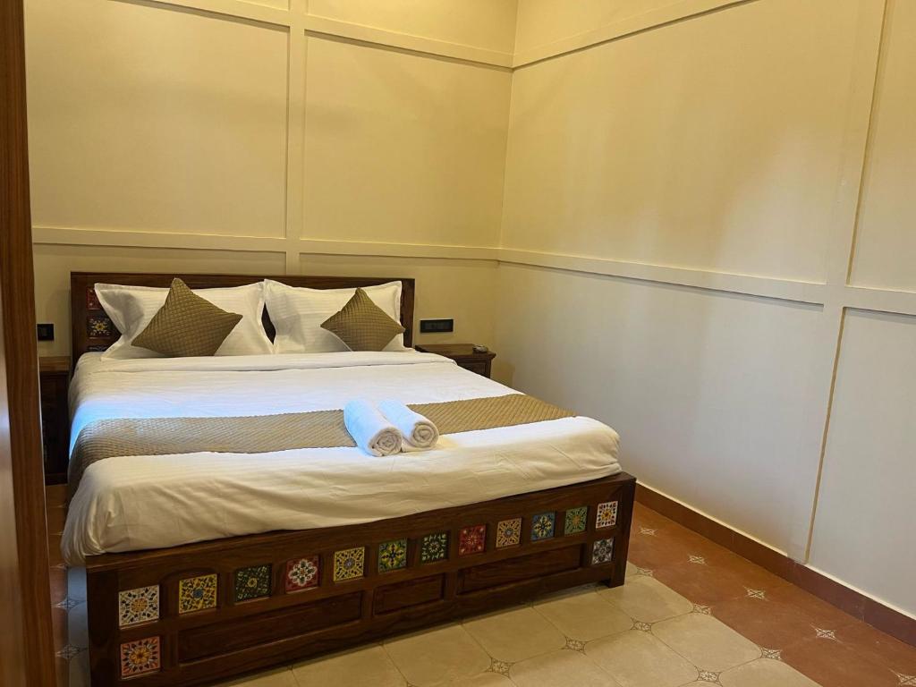 Postel nebo postele na pokoji v ubytování Hotel Lotus