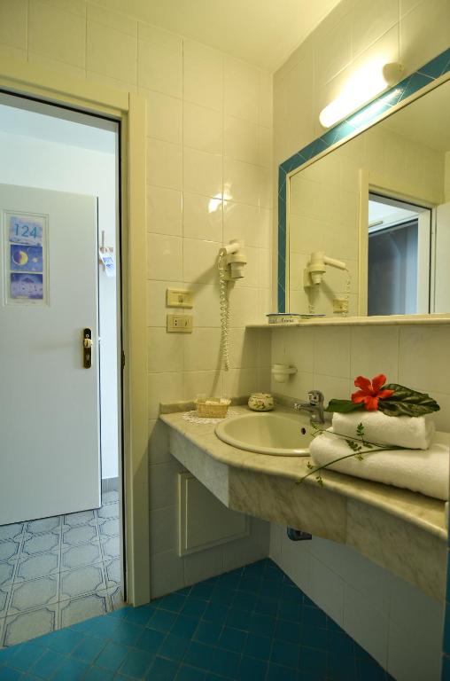 Koupelna v ubytování Hotel Aurora