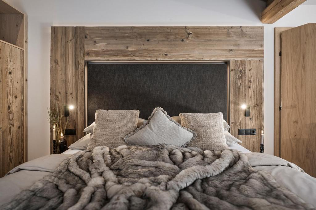 Postel nebo postele na pokoji v ubytování BRUGGER ApartHotel