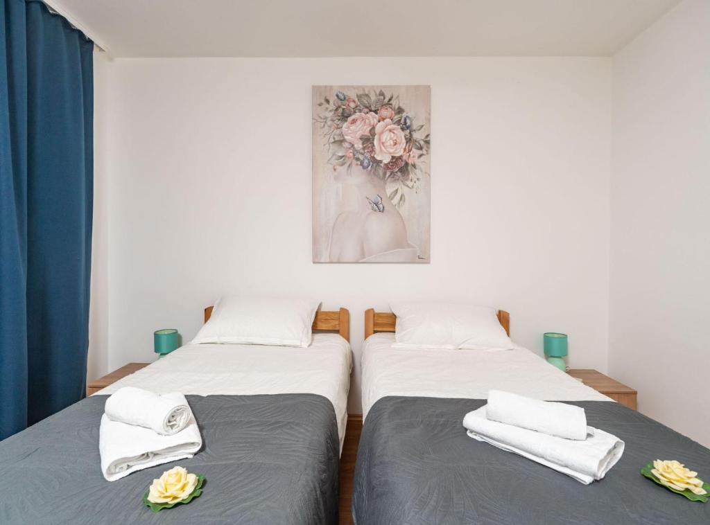 Posteľ alebo postele v izbe v ubytovaní Apartment Lolo