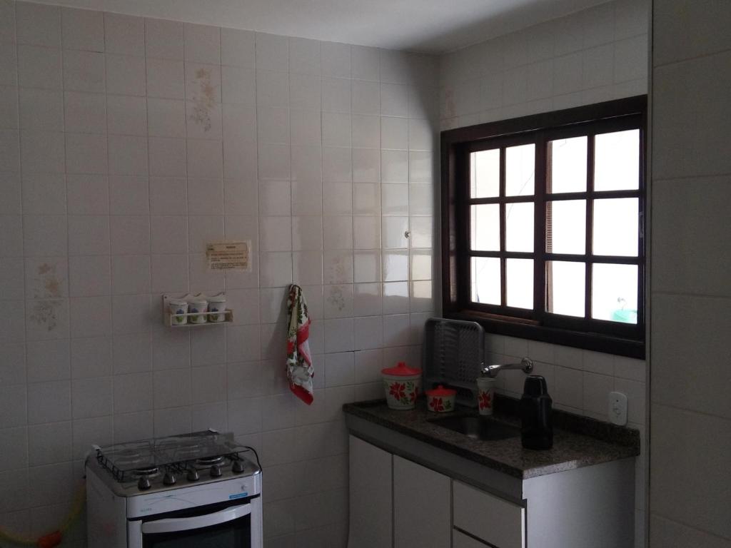 Kuchyň nebo kuchyňský kout v ubytování Residencial Doce Marina