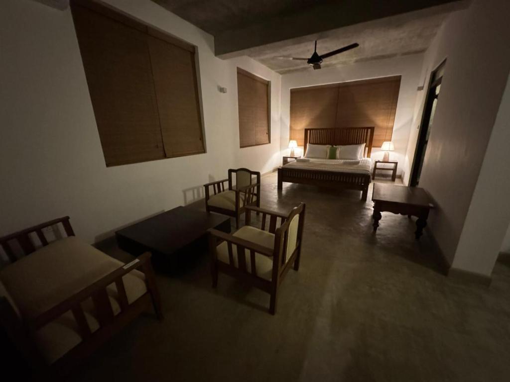 Postel nebo postele na pokoji v ubytování Stonewater Beach Villa, Negombo