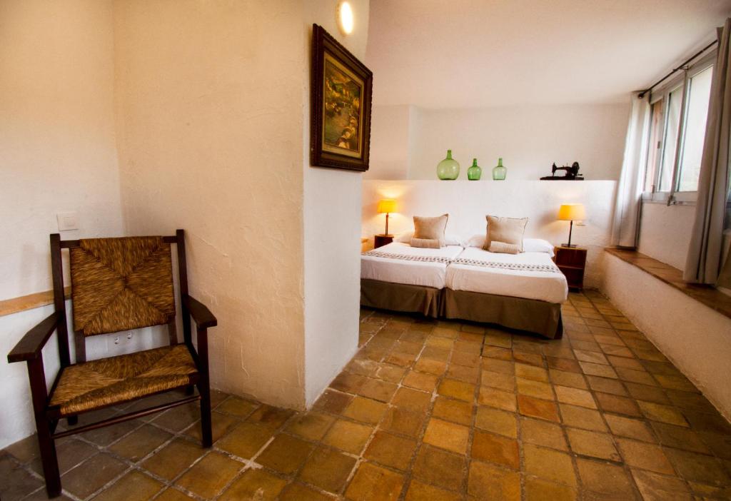 Postel nebo postele na pokoji v ubytování S´Hostal d´Esporles