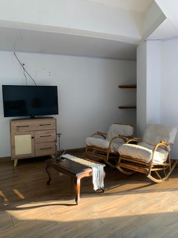 TV a/nebo společenská místnost v ubytování Hotel el Ancla Campestre