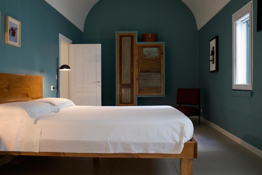 Postel nebo postele na pokoji v ubytování B&B Casa Ninè