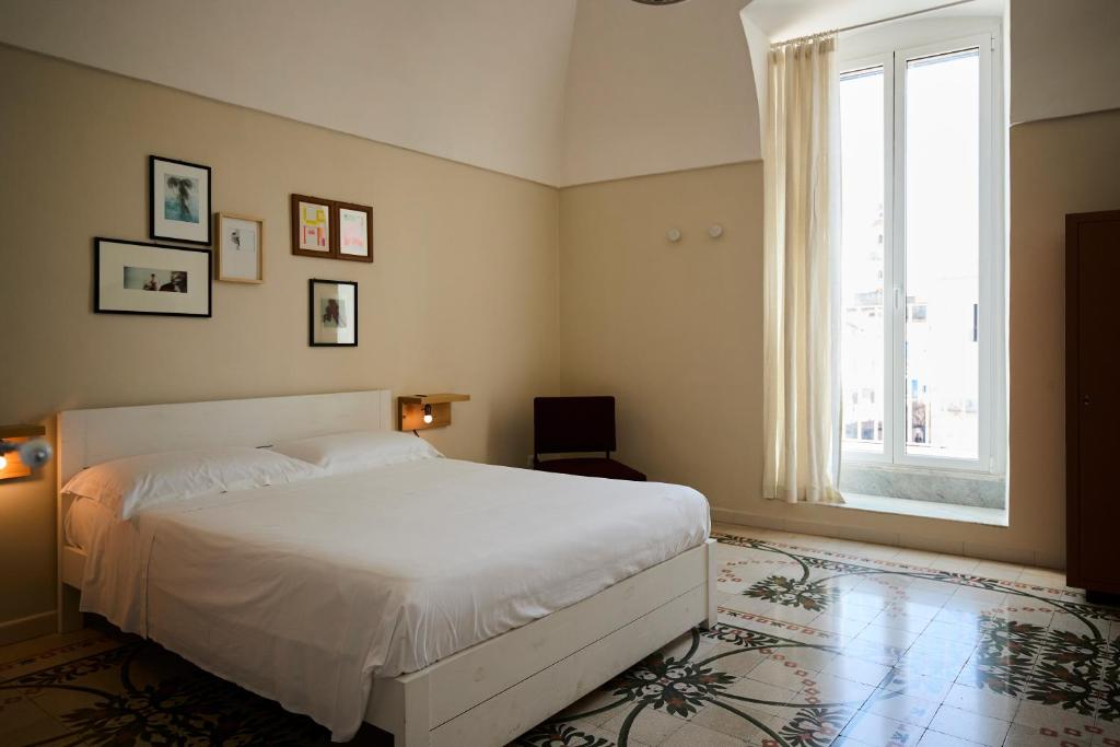 Postel nebo postele na pokoji v ubytování B&B Casa Ninè