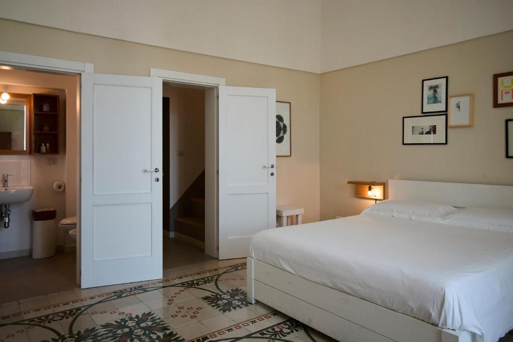 Postel nebo postele na pokoji v ubytování B&B Casa Ninè