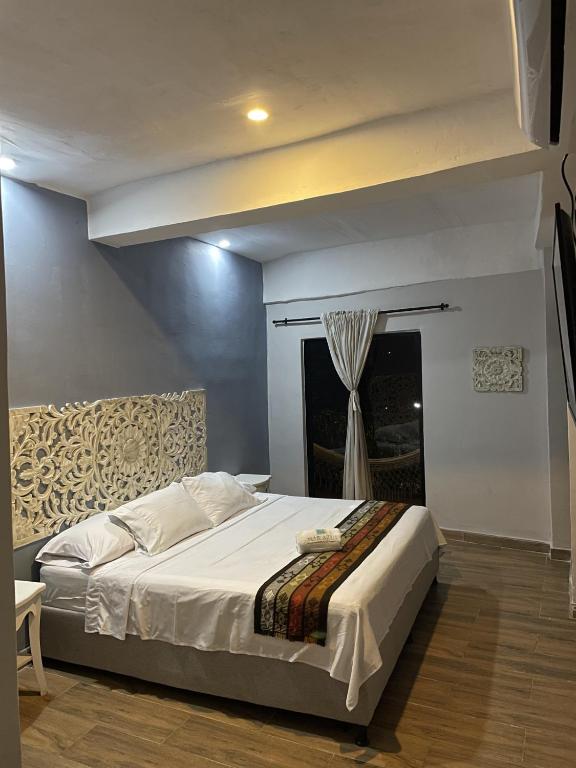 Postel nebo postele na pokoji v ubytování Hotel el Ancla Campestre