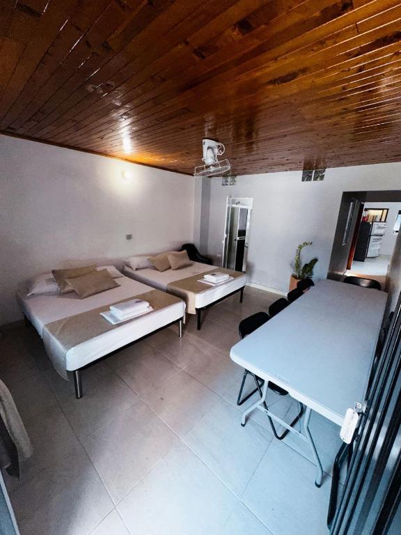 Postel nebo postele na pokoji v ubytování Casa Turistica JM