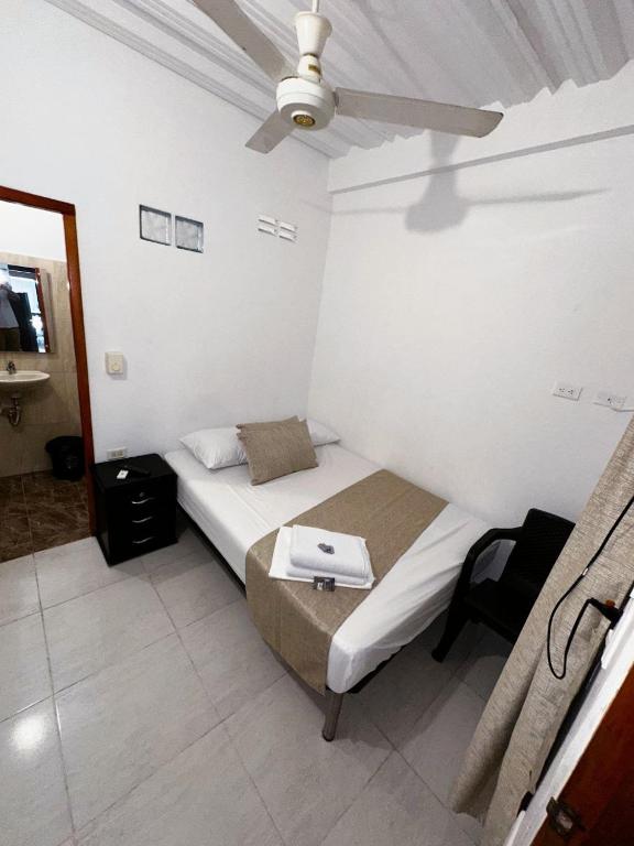 Postel nebo postele na pokoji v ubytování Casa Turistica JM