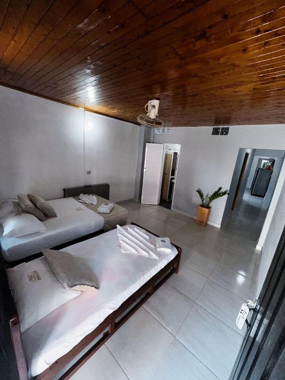 Postel nebo postele na pokoji v ubytování Casa Turistica JM