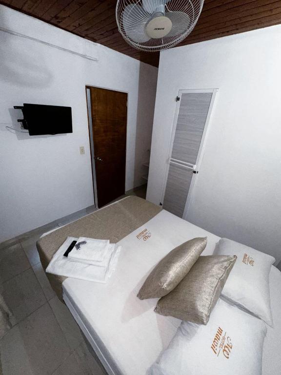 Postel nebo postele na pokoji v ubytování Casa Turistica JM