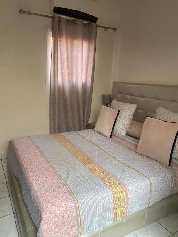 Postel nebo postele na pokoji v ubytování Riad Lyna