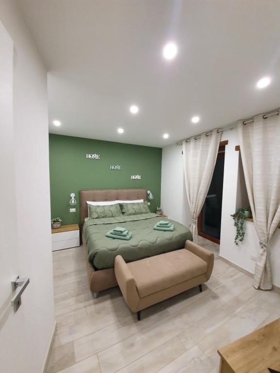 En eller flere senge i et værelse på La Casina Verde