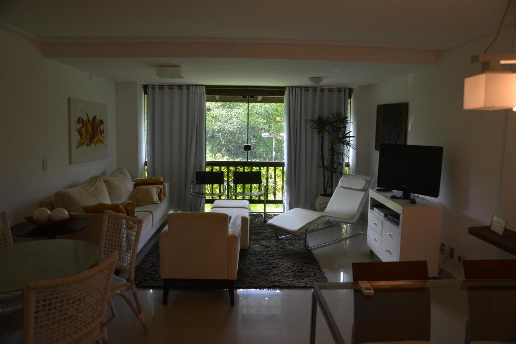Apartamento Cobertura Condomínio Marina Riverside tesisinde bir oturma alanı