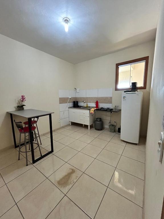 Η κουζίνα ή μικρή κουζίνα στο Apartamento em Ouro Branco