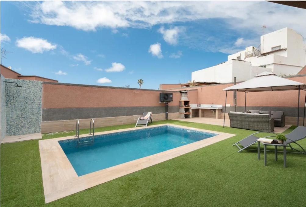 a swimming pool on top of a building at Villa TEJINA BEAUTIFUL in Guía de Isora