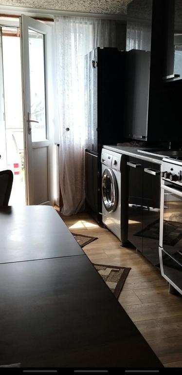 Kuchyň nebo kuchyňský kout v ubytování Guest House Misho