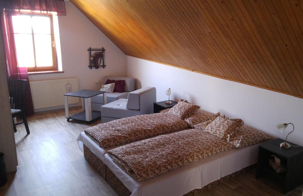 Postel nebo postele na pokoji v ubytování B&B Nika