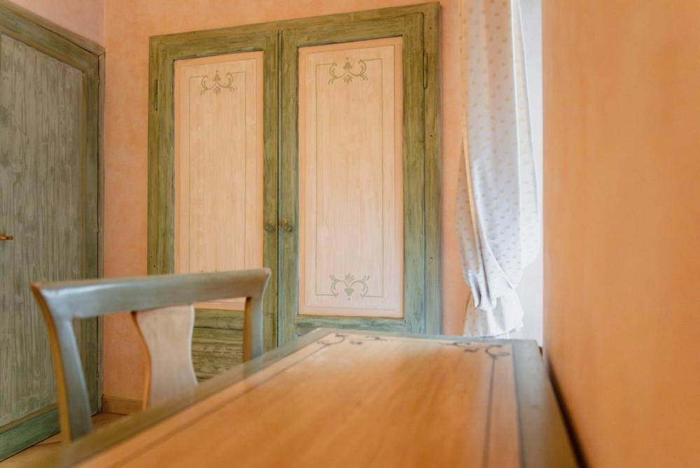 Postel nebo postele na pokoji v ubytování Hotel Rossi