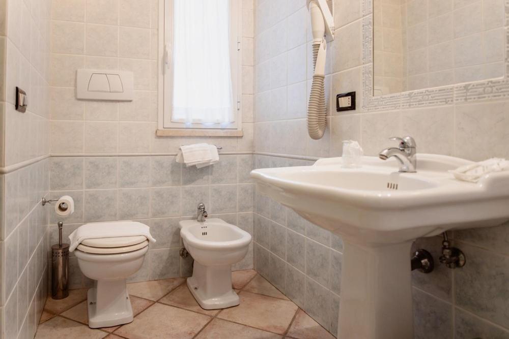Koupelna v ubytování Hotel Rossi