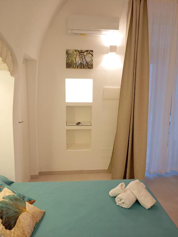 Postel nebo postele na pokoji v ubytování B&b La Fontana