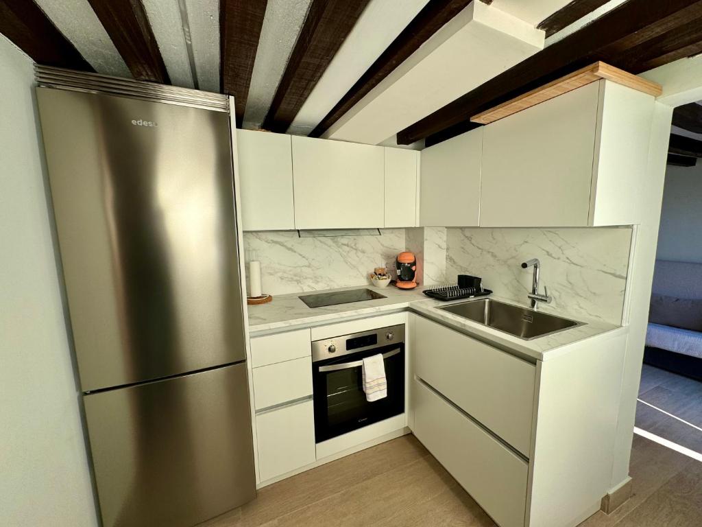 Kuchyň nebo kuchyňský kout v ubytování Casa Cuartel