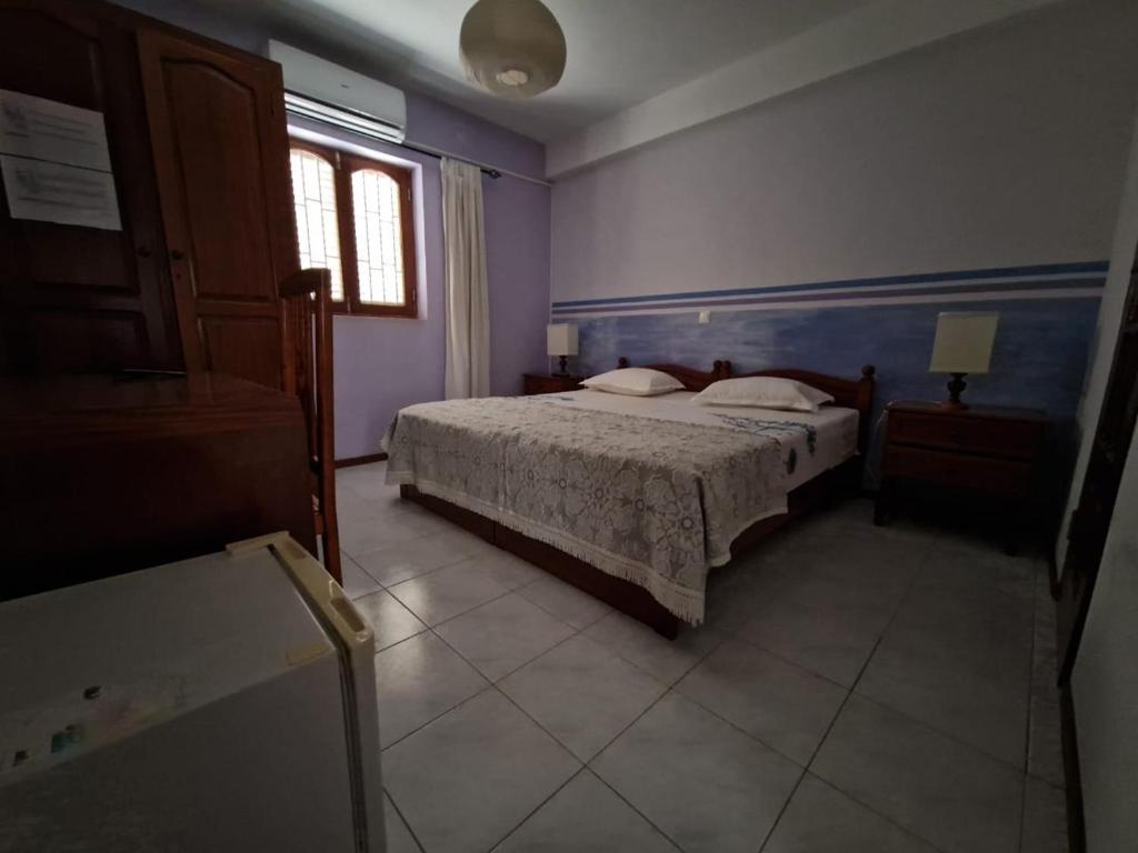 Postel nebo postele na pokoji v ubytování Residencial Raiar