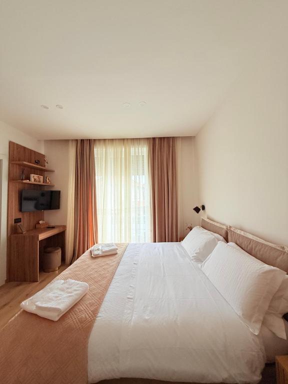 Postel nebo postele na pokoji v ubytování Bala Dream House